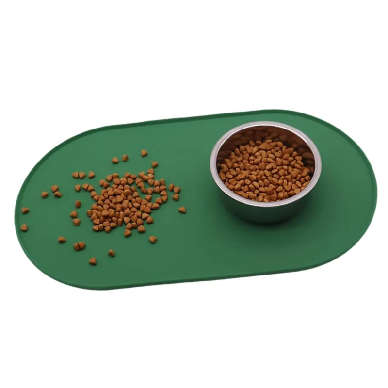 Two green oval silicone pet feeding mats in different sizes